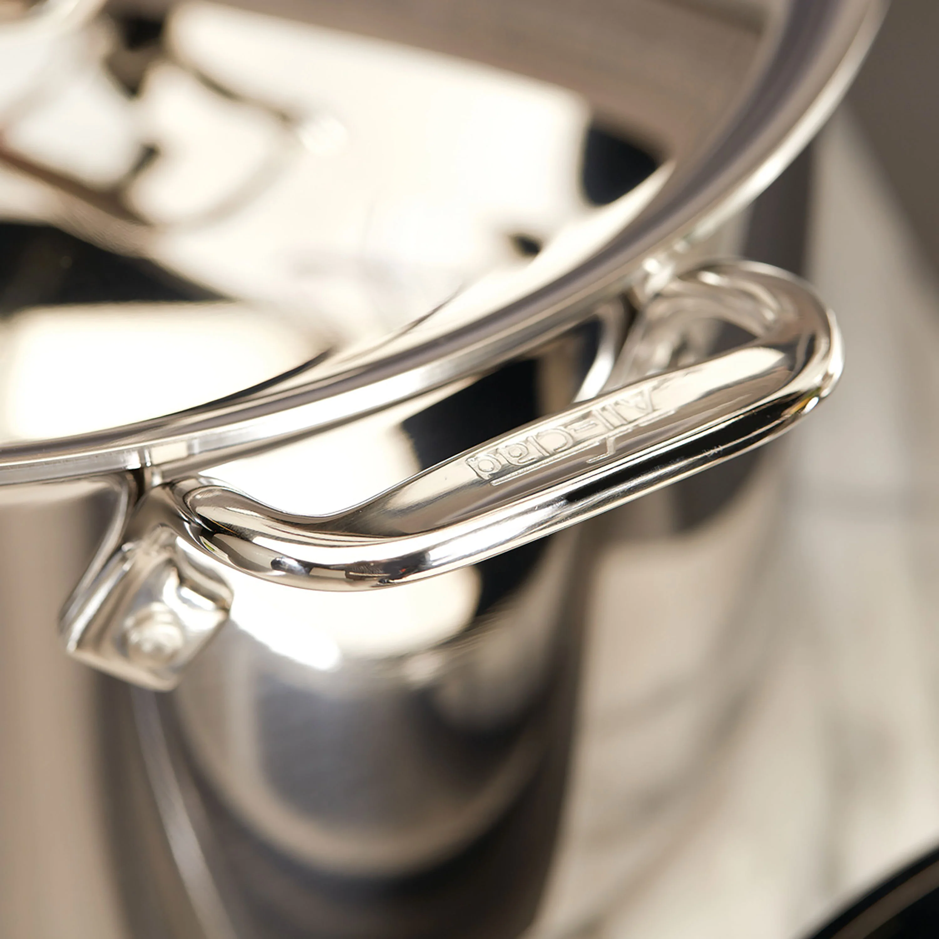 All-Clad d3 Stainless 4-quart Saucepan with Helper Handle - Image 5