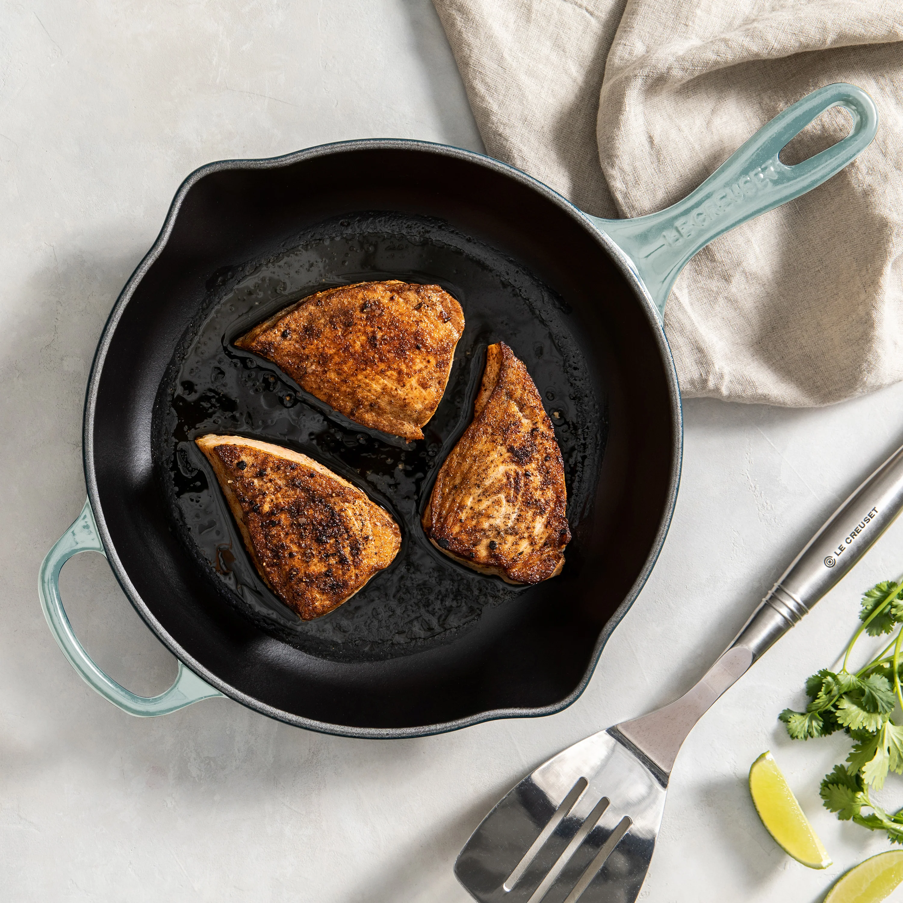 Le Creuset Signature Cast Iron 10.25" Sea Salt Iron Handle Skillet - Image 5