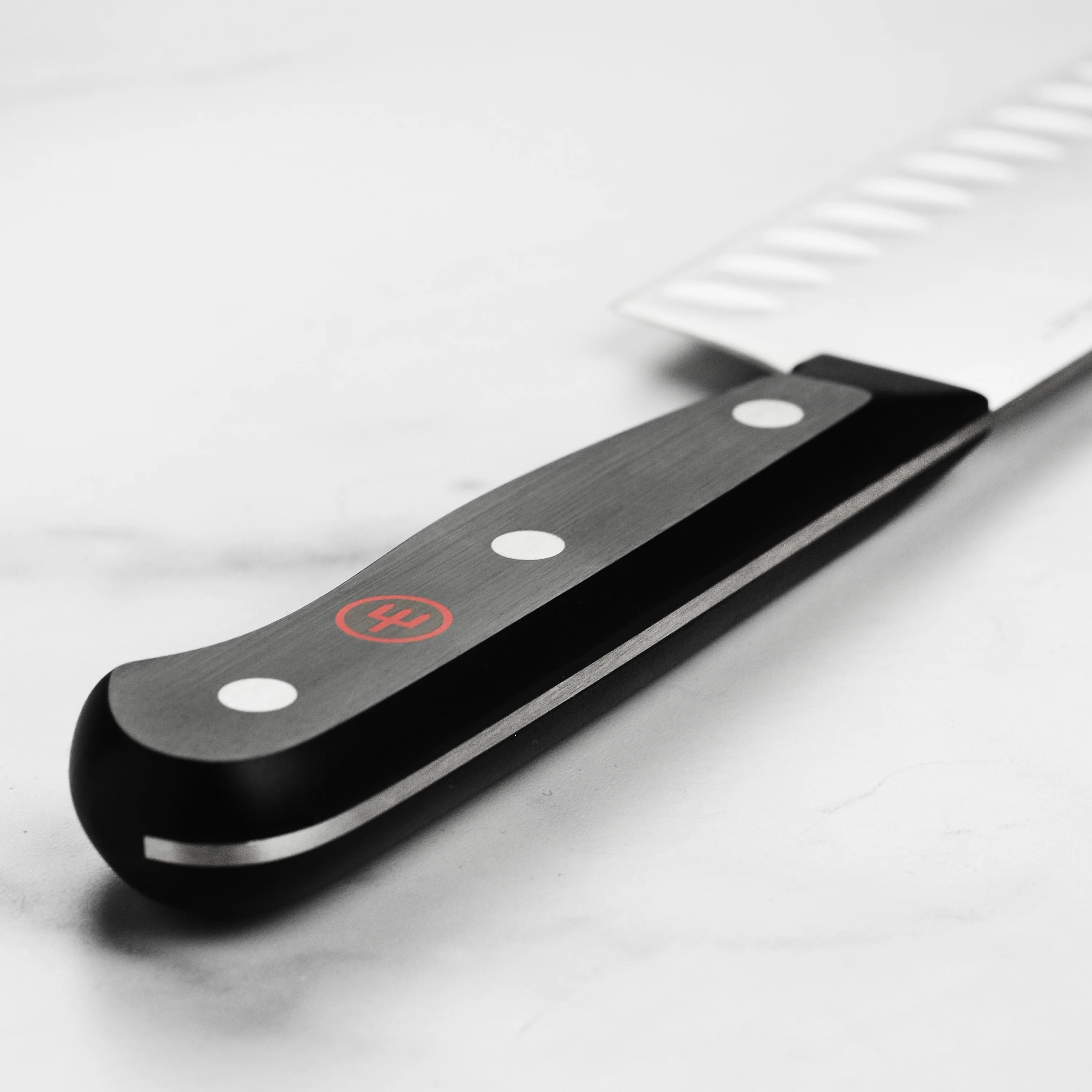 Wusthof Gourmet 7" Hollow Edge Santoku Knife - Image 6
