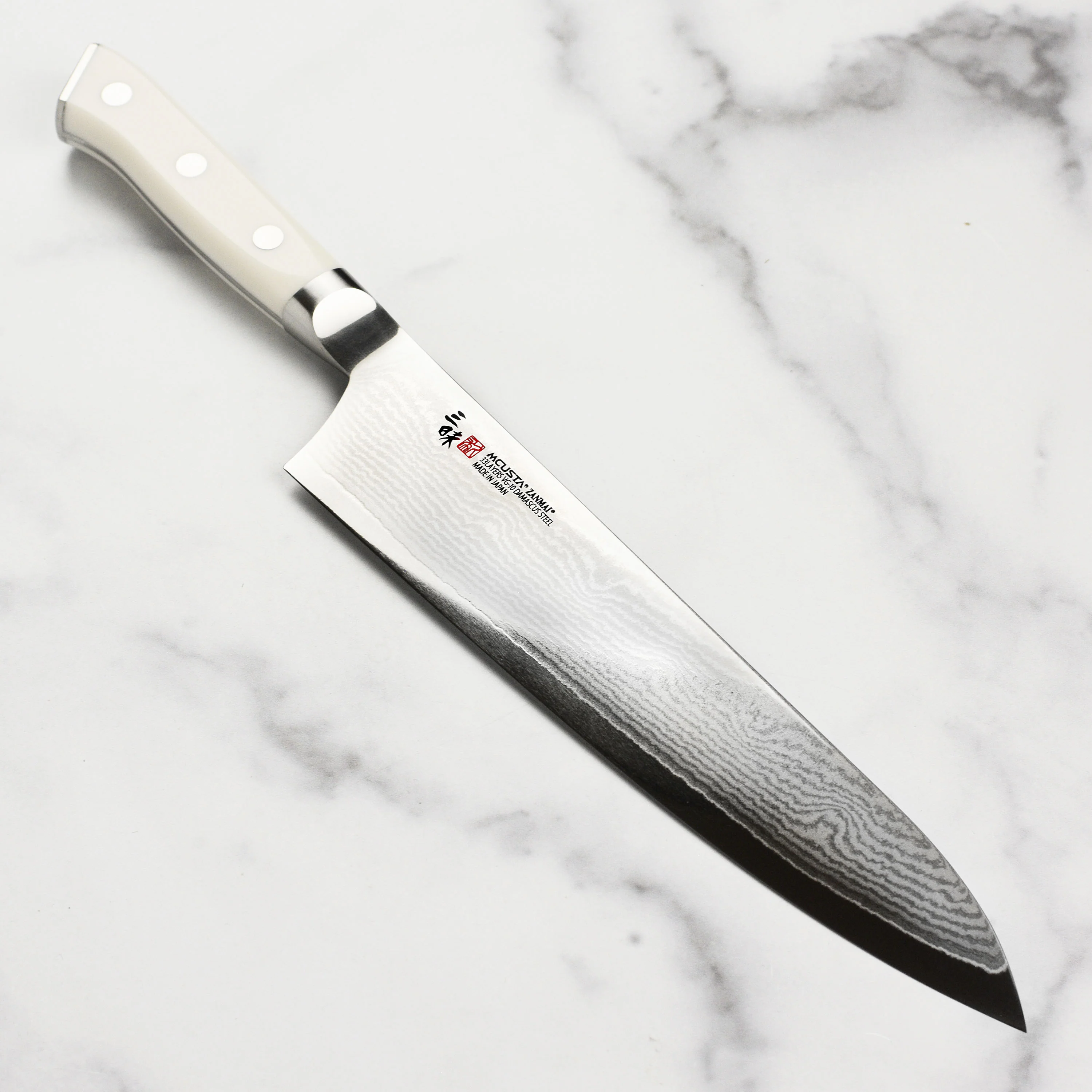 Zanmai Classic Damascus Corian 9.4" Gyuto