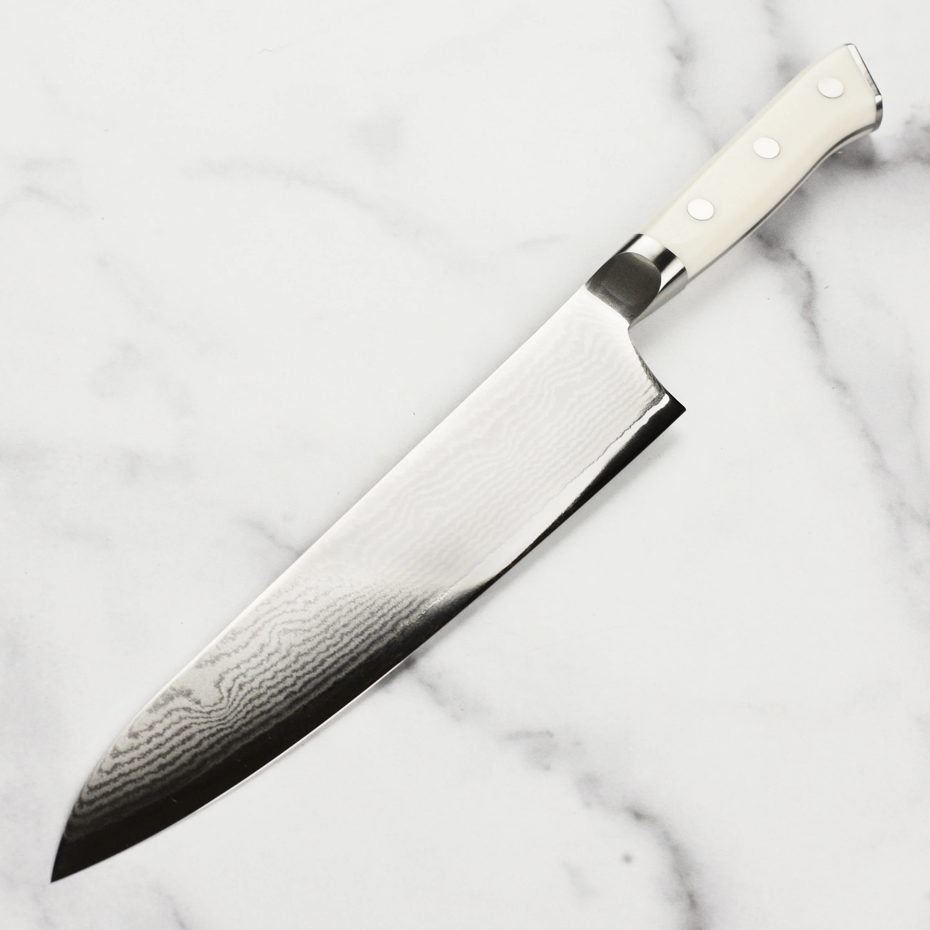 Zanmai Classic Damascus Corian 9.4" Gyuto - Image 5