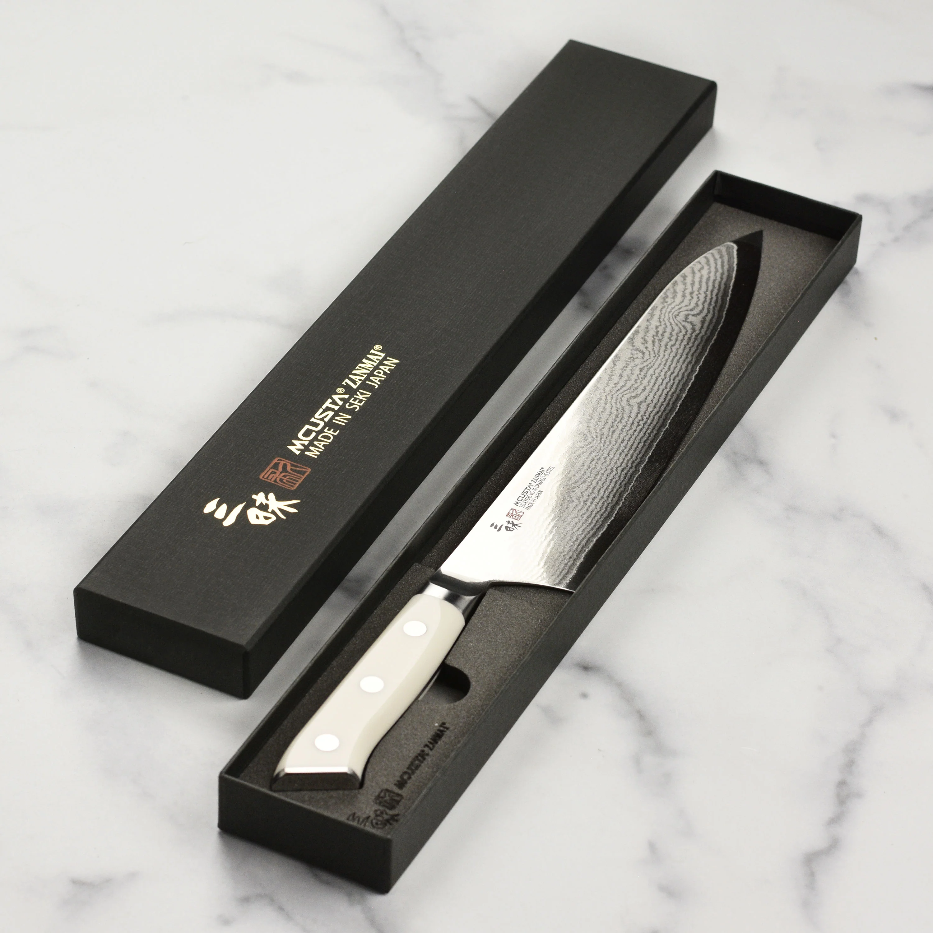 Zanmai Classic Damascus Corian 9.4" Gyuto - Image 6