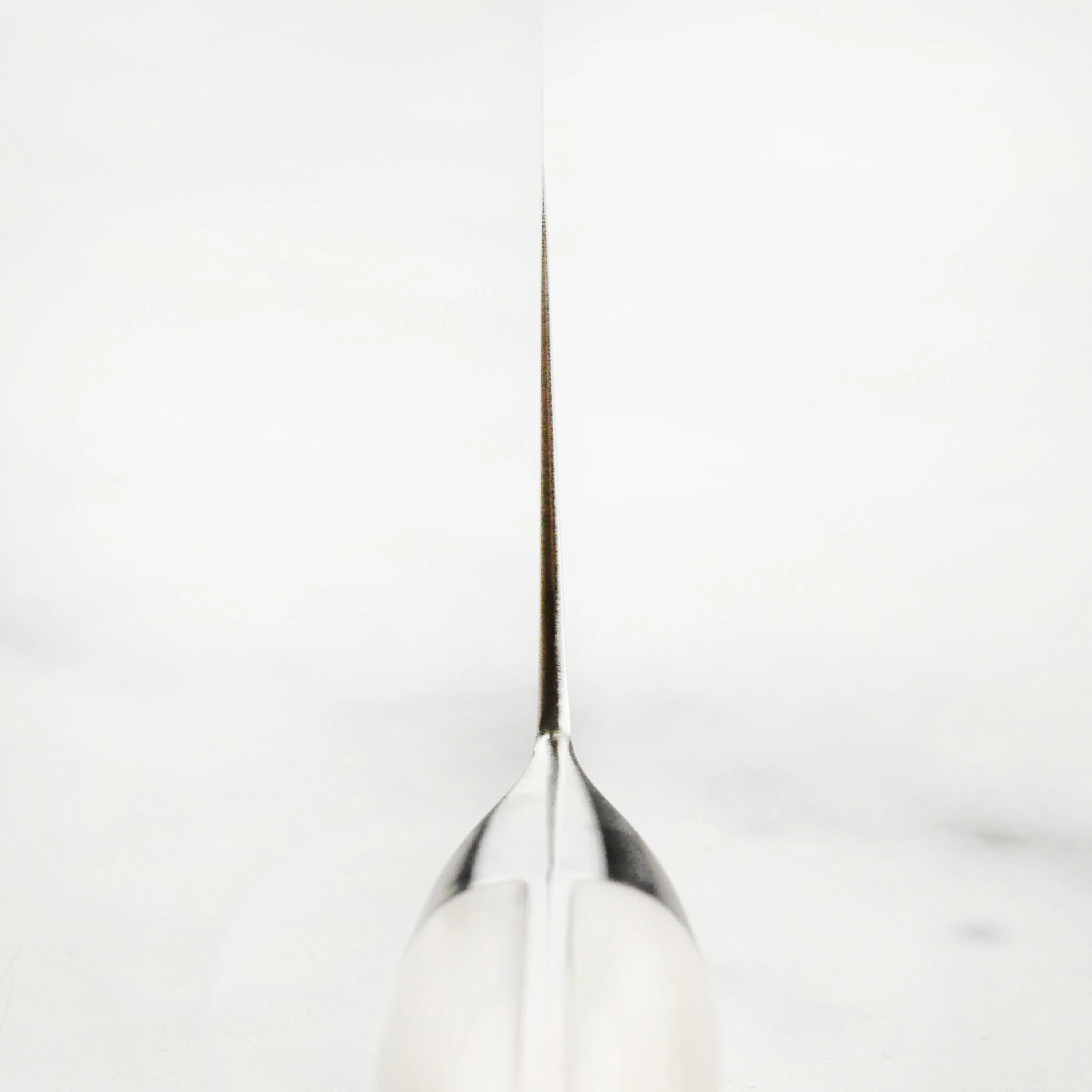Zanmai Classic Damascus Corian 7" Santoku - Image 7