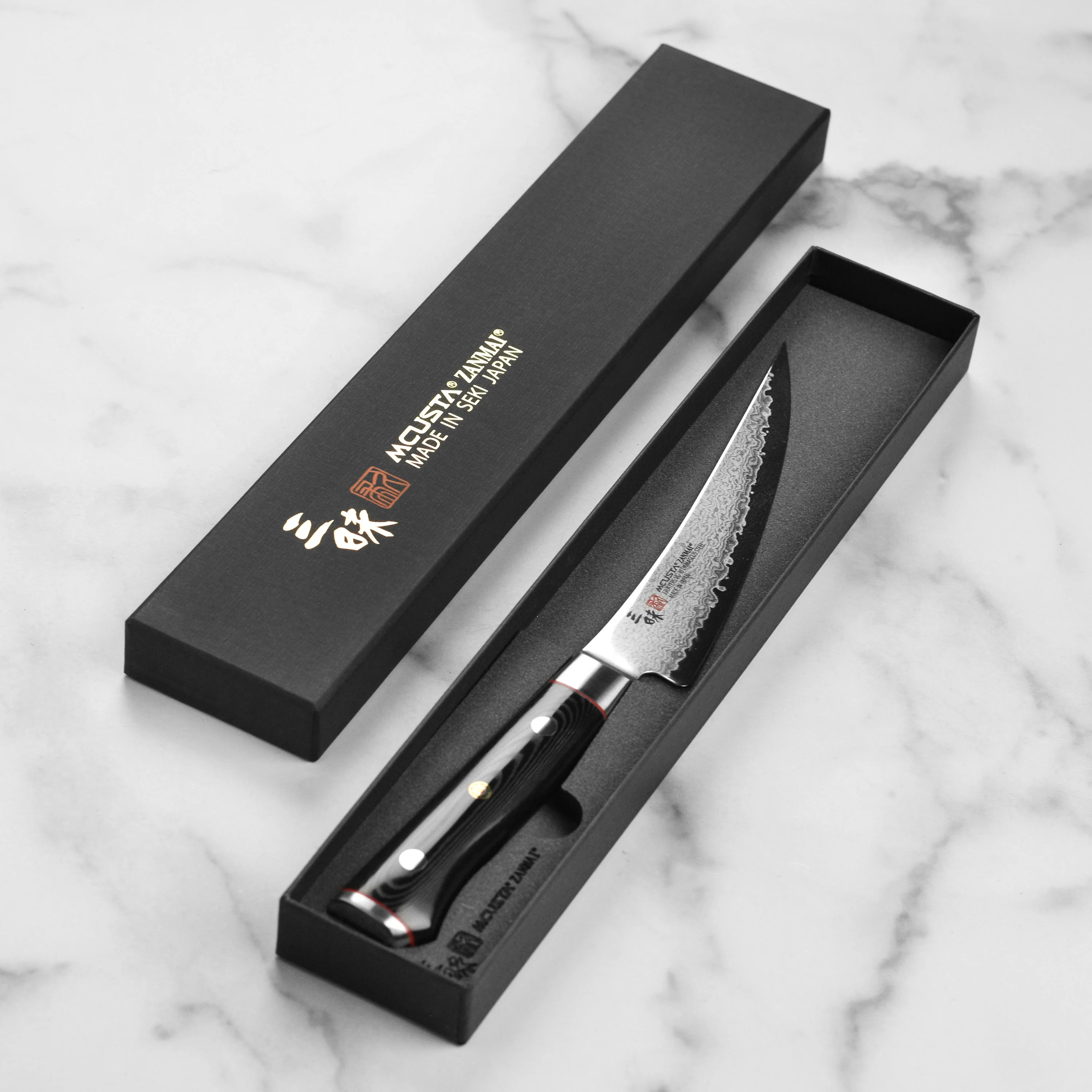Zanmai Classic Pro Zebra Damascus 6.5" Curved Boning Knife - Image 6